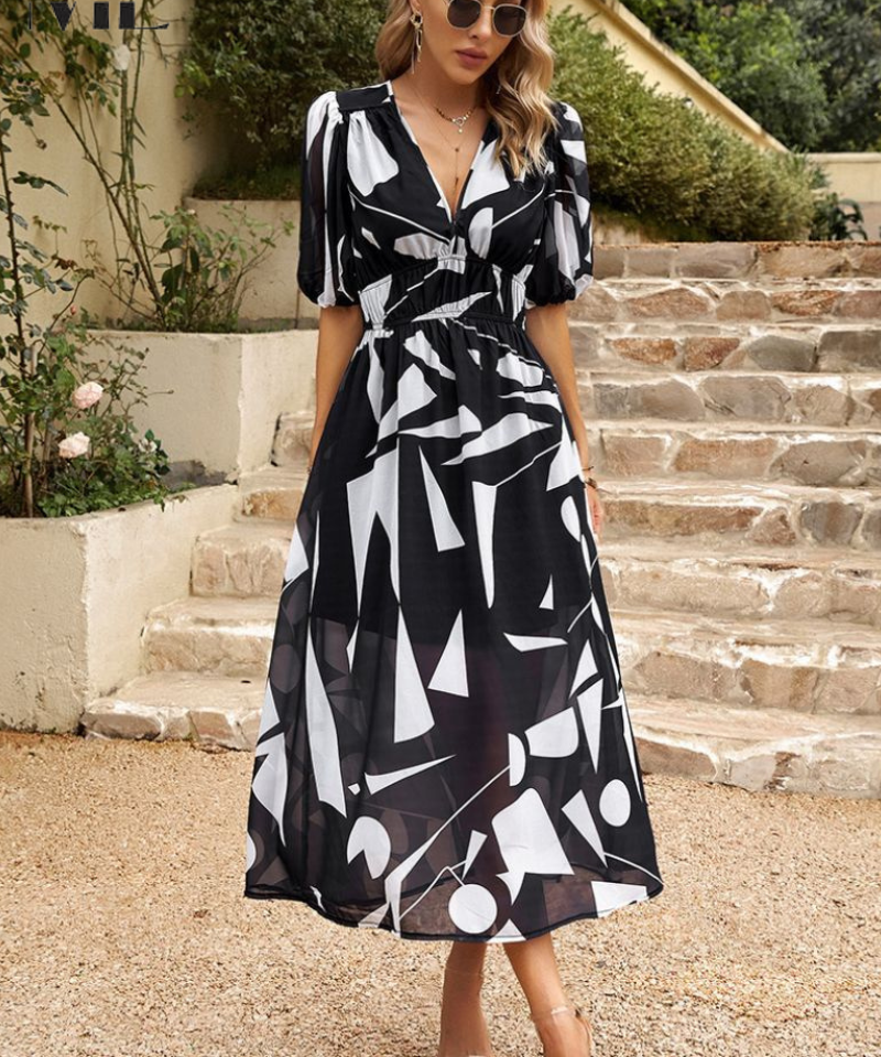 Elegantes Blumen-Midis-Kleid mit Ballonärmeln